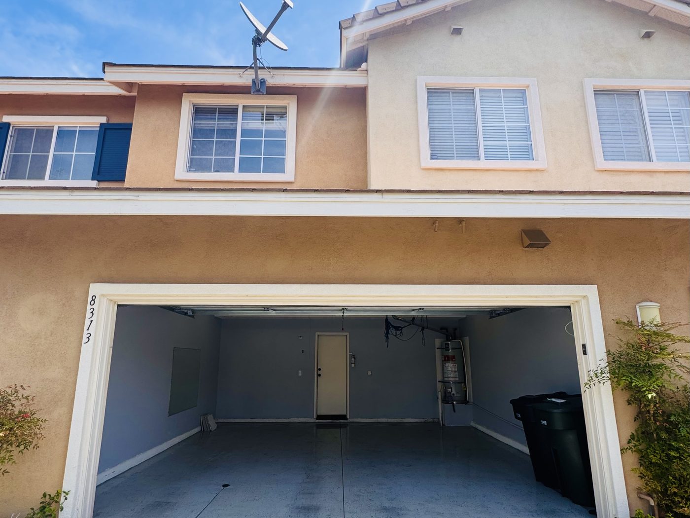 Attached two car garage off the driveway