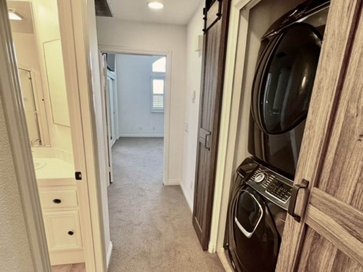 Hallway with inside laundry